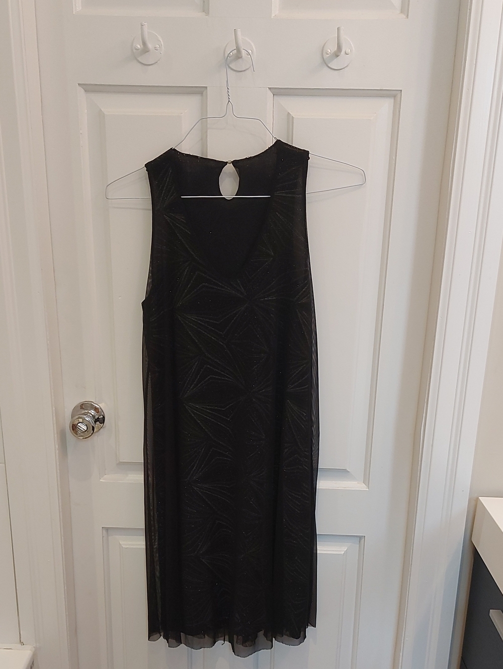 Classic Black Sleeveless Midi Dress with Subtle Pattern